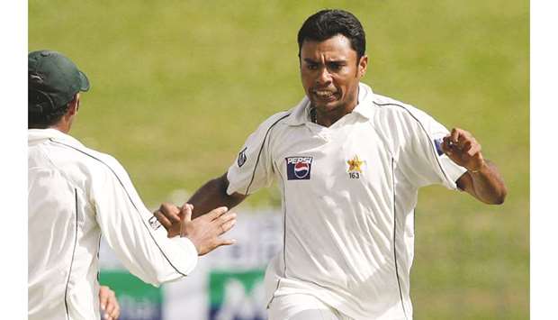 Pakistanu2019s Danish Kaneria celebrates taking the wicket of Sri Lankau2019s Malinda Warnapura with teammates on the fourth day of their third Test in Colombo on July 23, 2009. (Reuters)