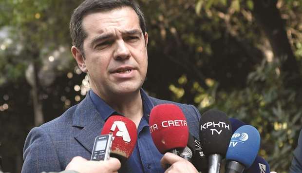 Greek Prime Minister Alexis Tsipras makes a statement to the press in Athens following the resign of his Foreign Minister Nikos Kotzias.
