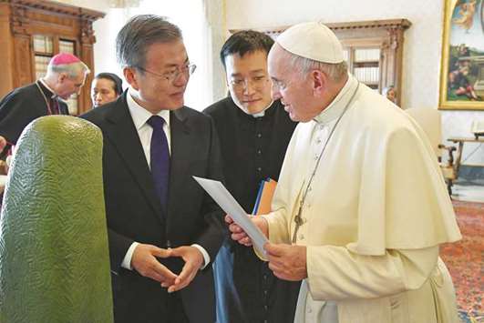 Pope Francis meets South Korean President Moon Jae-in during a private audience at the Vatican, yesterday.