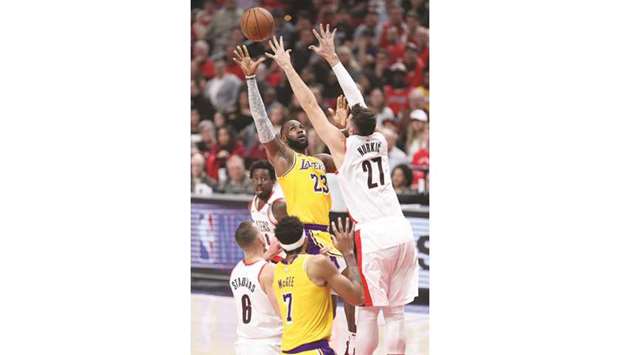 Los Angeles Lakers forward LeBron James shoots over Portland Trail Blazers centre Jusuf Nurkic in the first half of their NBA game at Moda Center. PICTURE: USA TODAY Sports