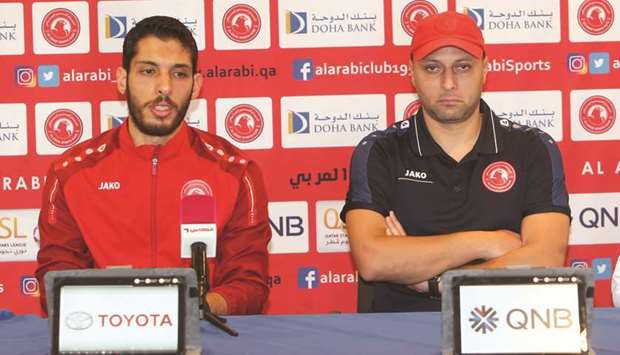 Al Arabi coach Hatem al-Moaddeb (right) and goalkeeper Shata Abbasi address the media ahead of their game against Al Ahli.