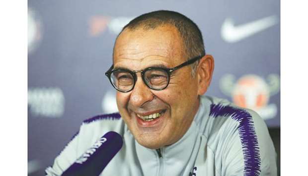 Chelsea manager Maurizio Sarri is all smiles during a press conference in London yesterday. (Reuters)