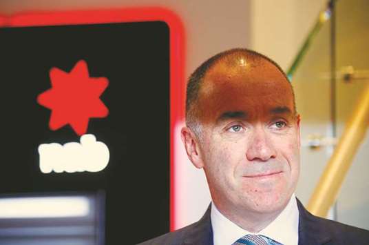 National Australia Bank CEO Andrew Thorburn poses for photographs during an official event at a branch in Sydney. Thorburn said he was ashamed of the banku2019s behaviour and admitted he had been wrong to oppose a commission of inquiry which has exposed scandal after scandal in the countryu2019s greed-driven banking culture.
