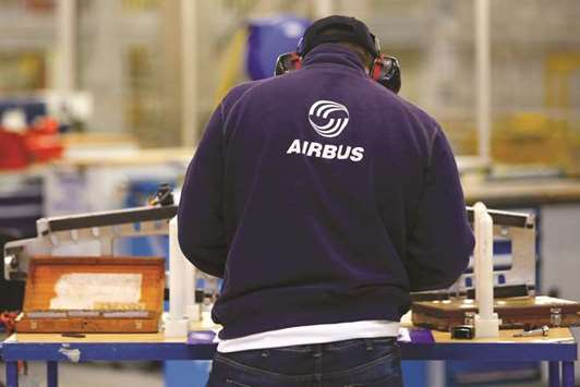 An Airbus employee works on a section of wing inside the A320/A330 assembly building at the Airbus Group plant in Broughton, UK. Airbus said its defence chief Dirk Hoke would not attend the Saudi investment conference given a new guideline ordering executives to abstain from high profile engagements there.