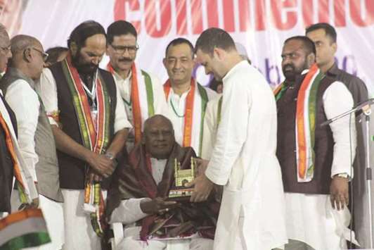 Congress President Rahul Gandhi presents the Rajiv Gandhi Sadbhavana Yatra commemoration award to former chief minister of undivided Andhra Pradesh K Rosaiah in Hyderabad yesterday.