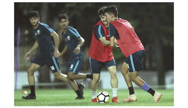 Qatar players take part in a training session ahead of their Group A match against Indonesia in the AFC U-19 Championship in Jakarta, Indonesia, yesterday. PICTURES: Fadi al-Asaad