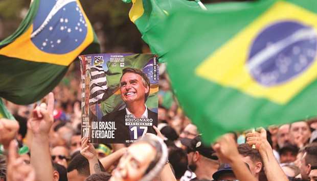 Supporters of Brazilian presidential candidate Jair Bolsonaro attend a demonstration at Paulista Avenue in Sao Paulo, Brazil on September 30.