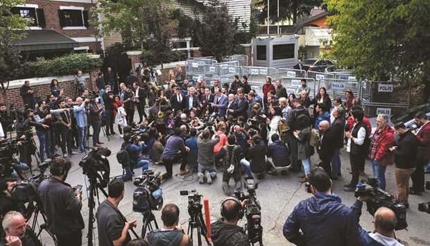 Turkish journalist Turan Kislakci, head of the Turkish-Arab Media Association, addressing media in front of the Saudi consulate in Istanbul, yesterday.