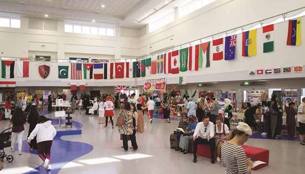 A RICH MIX: Main hall of the school was decorated with national flags of the participating countries.