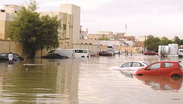 Vehicles caught in rainwater at a residential locality in Al Rayyan: PICTURE: Shemeer Rasheed