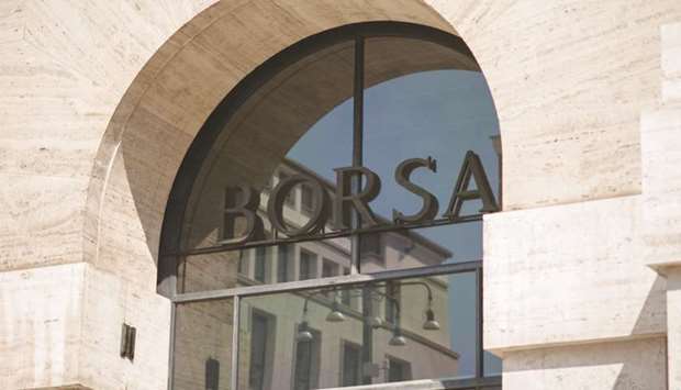 Italyu2019s stock exchange, the Borsa Italiana which is part of the London Stock Exchange, stands in Milan. Italian government bonds, stocks and debt from Europeu2019s other peripheral nations may rally today after a ratings decision by Moodyu2019s Investors Service removed the immediate threat of a downgrade to junk.