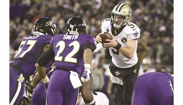 New Orleans Saints quarterback Drew Brees leaps for a first down during the fourth quarter against the Baltimore Ravens at M&T Bank Stadium. PICTURE: USA TODAY Sports