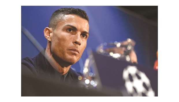 Juventusu2019 Portuguese striker Cristiano Ronaldo attends a press conference in Manchester. (AFP)