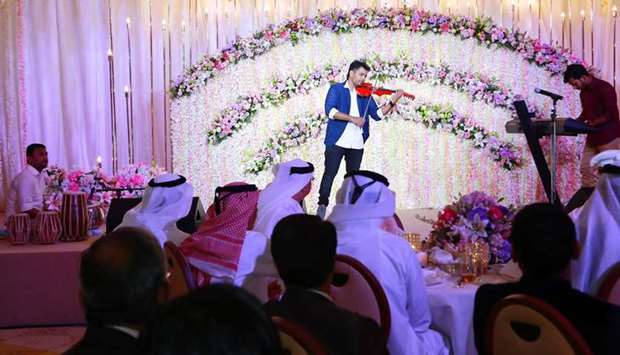 Balabhaskar performing at the marriage reception.
