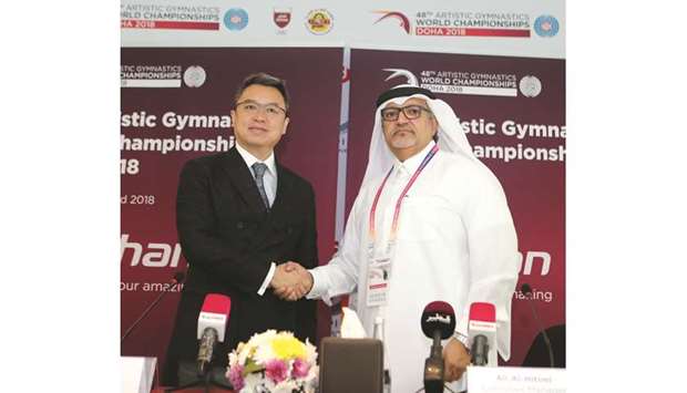 Ali al-Hitmi, Executive Manager of the Organising Committee and President Qatar Gymnastics Federation, with Gang Cui, Chairman, TaiShan, the company providing equipment for the championships.