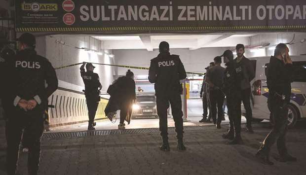 Turkish police stand guard as they cordoned off the underground car park in Istanbul where they found the abandoned car.