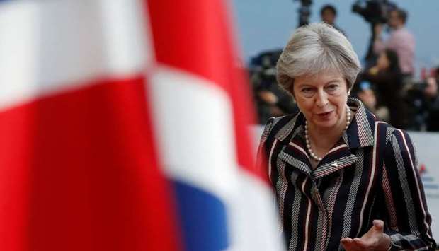 Britain's Prime Minister Theresa May is pictured as she arrives for a group photo at the ASEM leaders summit in Brussels, Belgium October 19, 2018.