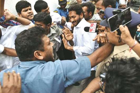 YSR Congress Party President Y S Jaganmohan Reddy arrives at the Visakhapatam airport where he was later attacked with a knife by a man.