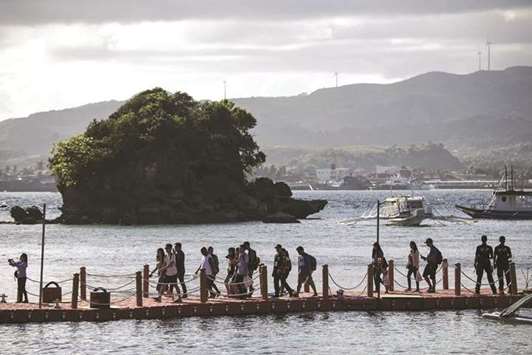 Tourists arrive at the island of Boracay, yesterday.