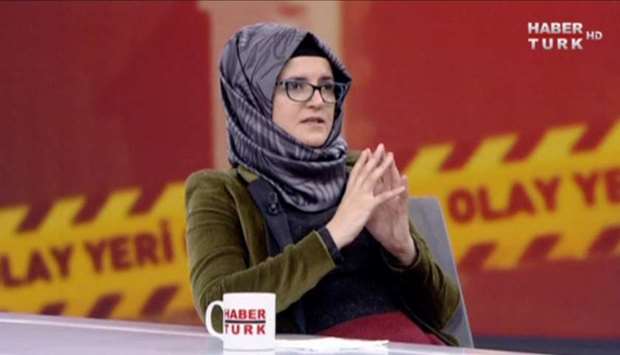 A still image taken from a video shows Hatice Cengiz, fiancee of slain Saudi journalist Jamal Khashoggi, during an interview with Turkish broadcaster Haberturk's anchorman Mehmet Akif Ersoy in Istanbul.