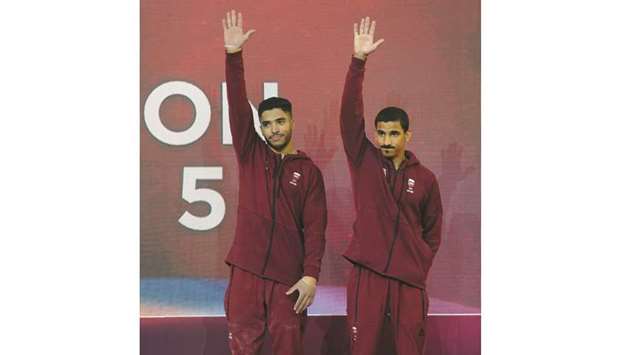 Qataru2019s Ahmed al-Dayani (left) and Ahmed Nabil Mosa.