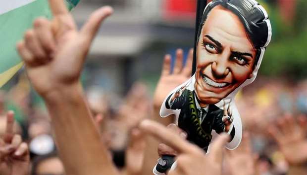 Supporters of presidential candidate Bolsonaro attend a demonstration in Sao Paulo