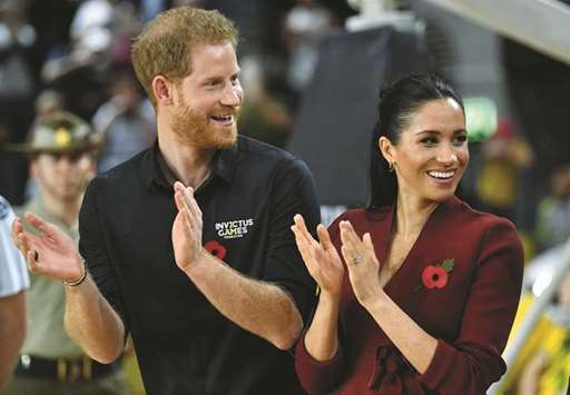 Prince Harry and his wife Meghan, the Duchess of  Sussex, attend the medal ceremony of the wheelchair basketball final at the Invictus Games 2018 in Sydney.