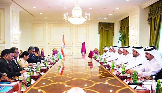 HE the Deputy Prime Minister and Minister of Foreign Affairs Sheikh Mohamed bin Abdulrahman al-Thani and India's External Affairs Minister of India Sushma Swaraj, chairing a meeting in Doha.