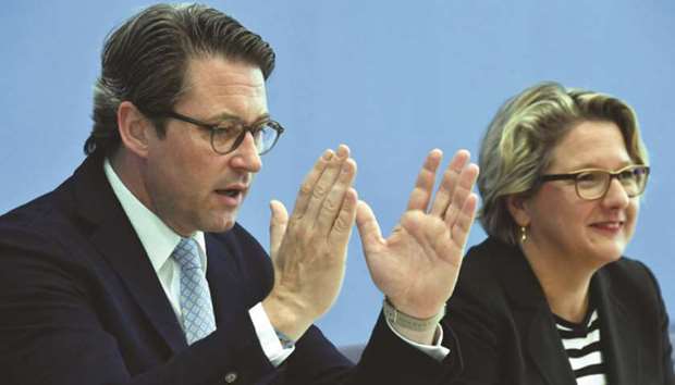 German Environment Minister Svenja Schulze (right) and German Transport Minister Andreas Scheuer addressing a press conference in Berlin yesterday. u201cFor months, I have appealed for hardware fixes (for old diesel vehicles), and Iu2019m happy that the federal government could agree on that,u201d Schulze said.