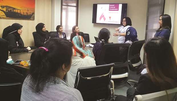 Participants of the forum listen to a presentation.