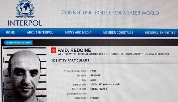 Paris showing the international wanted person notice for Redoine Faid