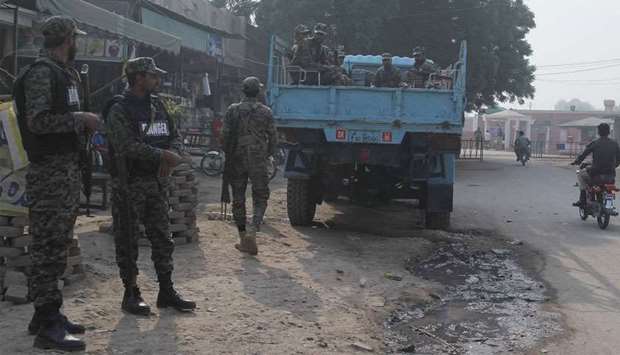 Pakistani paramilitary troopers patrol outside a central jail where Asia Bibi, a Christian blasphemy