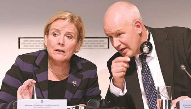 Dutch Minister of Defence Ank Bijleveld and British ambassador to the Netherlands Peter Wilson attend a news conference in The Hague, Netherlands, yesterday.