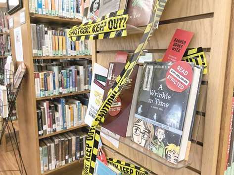 SIGNS OF THE TIMES: A display at the Guantanamo public library sought to educate patrons about the American Library Associationu2019s annual Banned Books Week. This yearu2019s theme: u201cBanning Books Silences Stories.u201d This photo was screened by a Navy base official, who approved its release to the public.