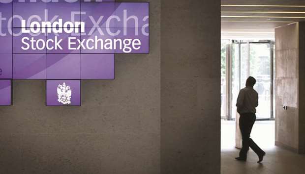 A man walks to the lifts inside the London Stock Exchange building (file). The FTSE 100 closed up 0.5% to 7,510.28 points yesterday.
