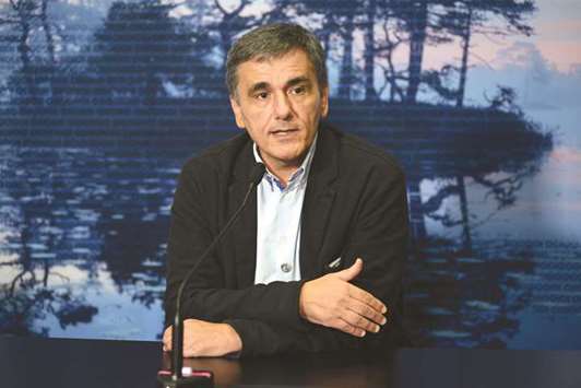 Euclid Tsakalotos, Greeceu2019s finance minister, speaks during the Eurogroup meeting in Tallinn, Estonia (file). Greeceu2019s government is constantly discussing new ideas for tackling bad loans with the relevant authorities, Tsakalotos said at a parliamentary debate yesterday.