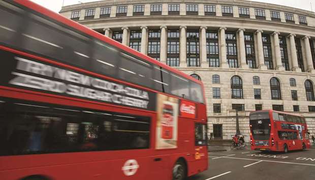 Buses pass Unilever House, the building that houses the UK base of Unilever, in London. Unilever had decided to collapse its Anglo-Dutch structure following a review sparked by last yearu2019s failed $143bn takeover approach by Kraft-Heinz.