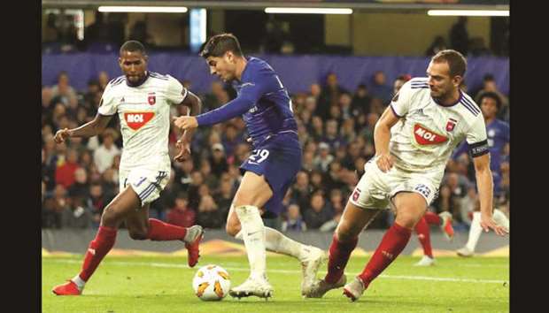 Chelseau2019s Alvaro Morata (centre) in action with Vidiu2019s Paulo Vinicius (left) and Roland Juhasz during the Europa League match at Stamford Bridge in London on Thursday night. (Reuters)