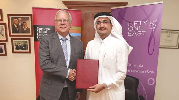 Bader al-Darwish, chairman and managing director of Fifty One East, with Michael Trick, dean of CMU-Q.