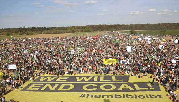 Demonstrators gather close to the Hambach Forest in western Germany in a protest to stop the ancient woodland from being razed for an expanding open-pit coal mine operated by energy company RWE.