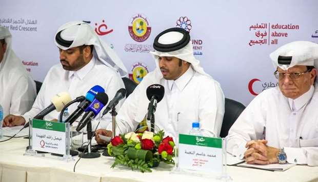 Officials announcing the initiative in Doha.rnrn