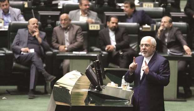 Iranu2019s Foreign Minister Mohamed Javad Zarif delivers a speech to the  parliament in Tehran, yesterday, over the a bill to counter terrorist financing.