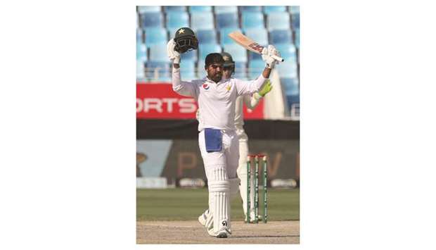 Pakistanu2019s Haris Sohail celebrates reaching his century against Australia at Dubai International Stadium in Dubai yesterday.