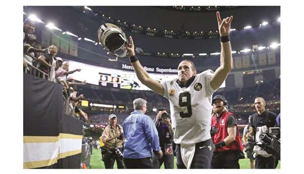 New Orleans Saints quarterback Drew Brees (9) celebrates after  setting a new NFL all-time passing yardage record during a game against the Washington Redskins at the Mercedes-Benz Superdome on Monday.  PICTURE: Chuck Cook-USA TODAY Sports