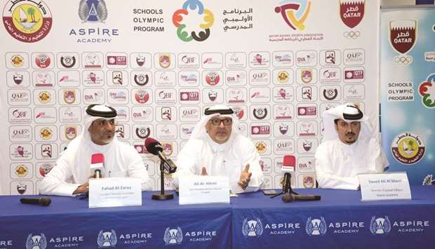 QSSA Secretary-General Ali al-Hitmi (centre), Chairman of the Football Development Committee of the Qatar Football Federation Captain Fahd Thani al-Zarra (left) and Aspire Academyu2019s Director of Football Affairs Saeed al-Marri at a press conference in Aspire yesterday.