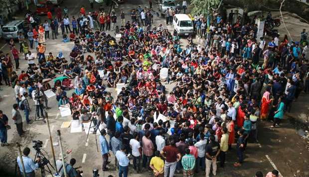 Students of Bangladesh University of Engineering and Technology (BUET) block a road and take part in a protest in Dhaka