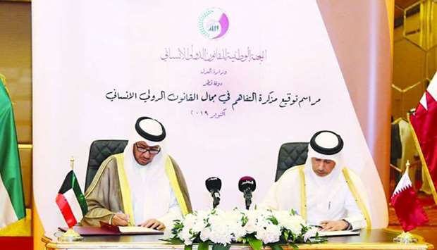 HE Dr al-Nuaimi and Dr al-Afasi sign the MoU on Thursday