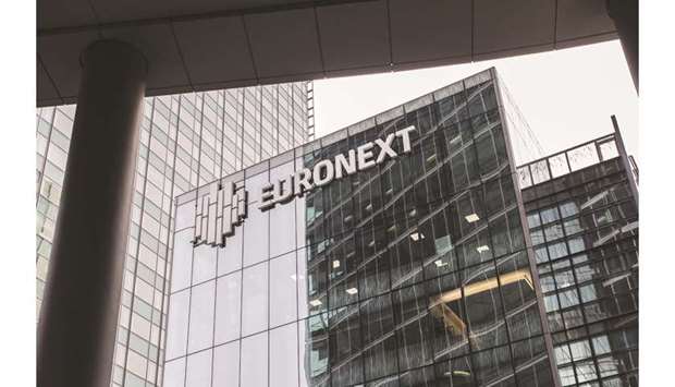 The Euronext logo is seen on the exterior of the Paris stock exchange in La Defense business district in Paris. CAC 40 ended 1.3% higher at 5,569.05 points at the close of trading yesterday.