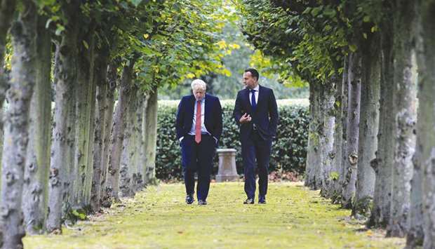 Irelandu2019s Prime Minister Leo Varadkar and Prime Minister Boris Johnson pose for a photograph at Thornton Manor Hotel, near Birkenhead, north-west England, yesterday.