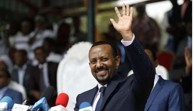 In this file photo taken on April 11, 2018 New Ethiopian Prime Minister Abiy Ahmed waves during his rally in Ambo, Ethiopia